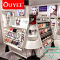 Professional Wall Mounted Showcase Shelving Cosmetic Shop Interior Design Luxury Cosmetics Shop Interior Design